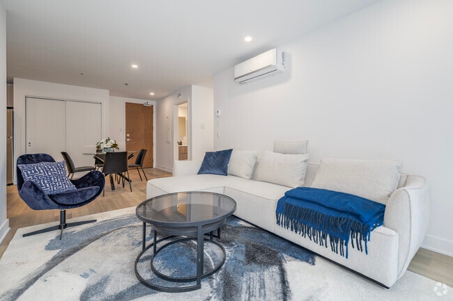 3BR, 2BA - 1155SF - Living Room - H1 Harmonie - 550 & 560 Delmar