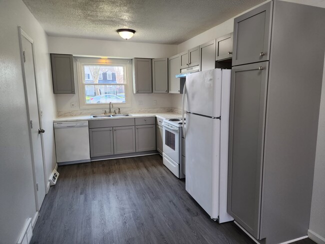 Cocina de concepto abierto - Rockspring Apartments