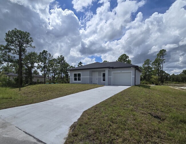 Building Photo - Brand New 2/2/1-South Lehigh Acres