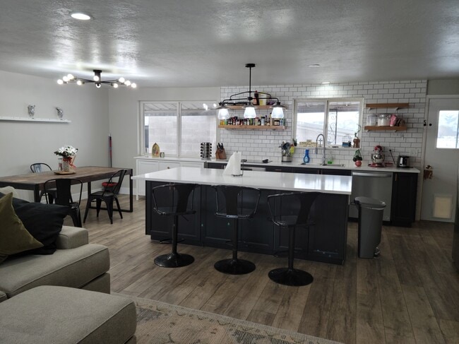Gourmet kitchen with granite counters and lots of storage. - 890 S 1600 W