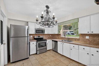 Building Photo - 9930 Frangipani Tree Way