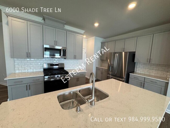 Building Photo - 6000 Shade Tree Ln