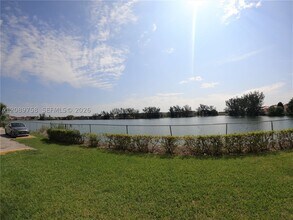 Building Photo - 9911 W Okeechobee Rd
