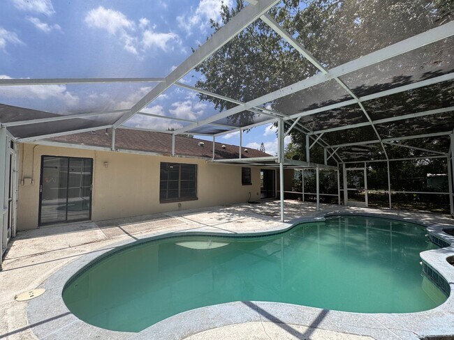 Building Photo - Beautifully Renovated 4 Bedroom Pool Home!