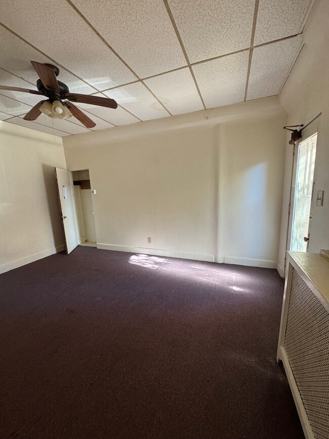 Livingroom with closet & ceiling fan - 151 N Hanover St