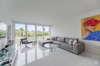 Building Photo - 10275 Collins Ave