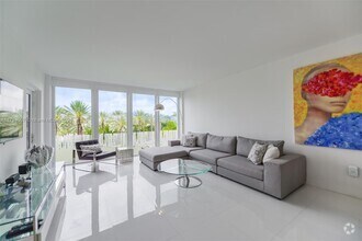Building Photo - 10275 Collins Ave