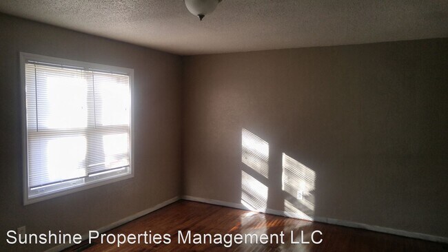 Building Photo - 2 br, 1 bath House - 409 N Rogers