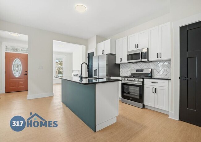 Foto del edificio - Spacious Four Bedroom Townhome with Main Level Suite in Holy Cross