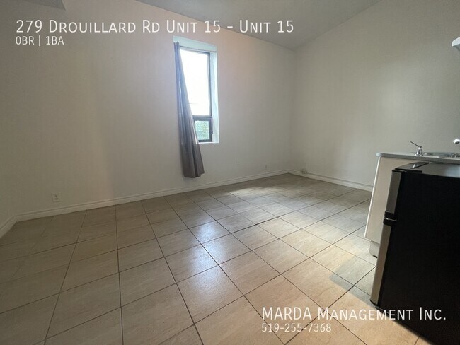 Photo du bâtiment - COZY BACHELOR UNIT - INCLUSIVE + FREE WIFI!!