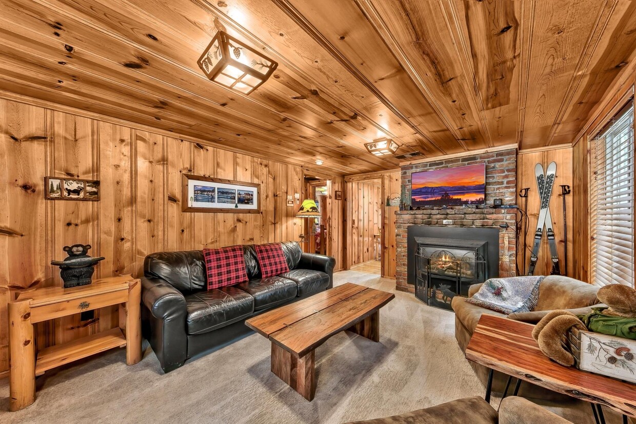 Living Room with Gas Fireplace and TV - 1139 Craig Ave