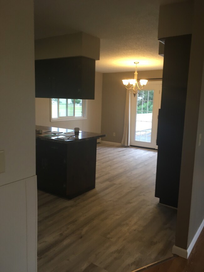 Kitchen and Dining room. - 2305 Ash Ave Nw