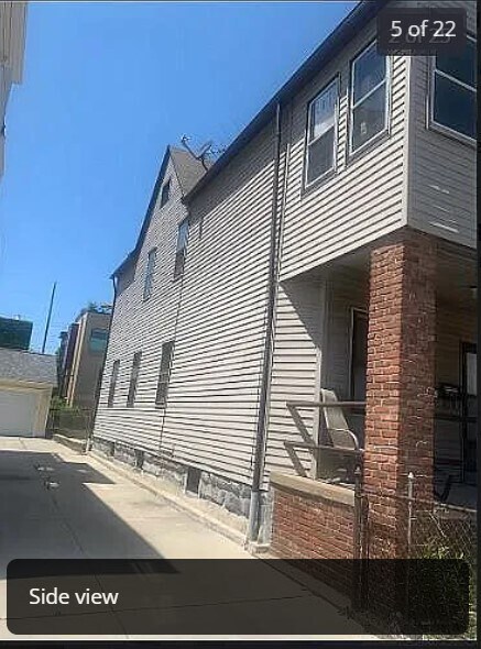 side of house & porch - 1914 E 120th St