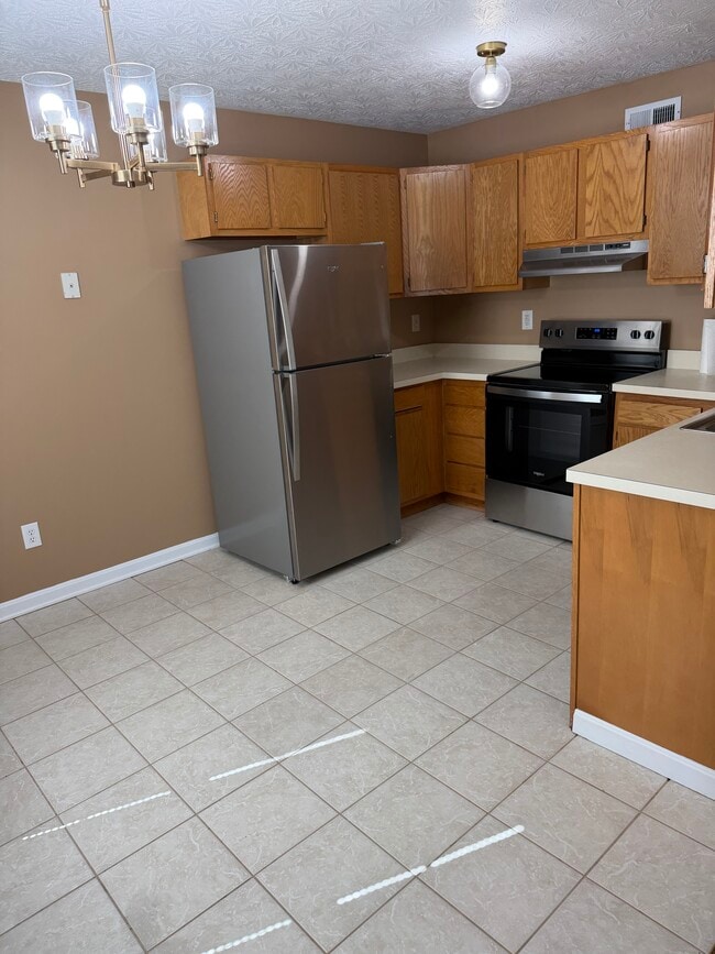 kitchen and dining area - 231 Highland Blvd