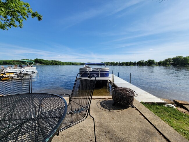 House Lakefront View off Patio - 5207 N Shore Dr