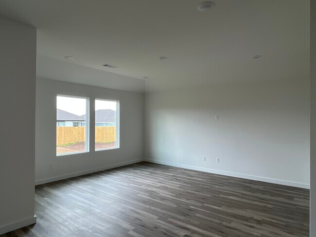 Living room is spacious! - 306 NW Pinwheel St