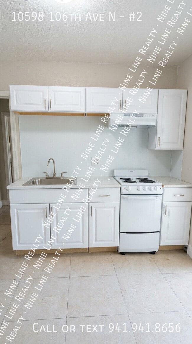 Photo - 10598 106th Ave N-#2 Apartment