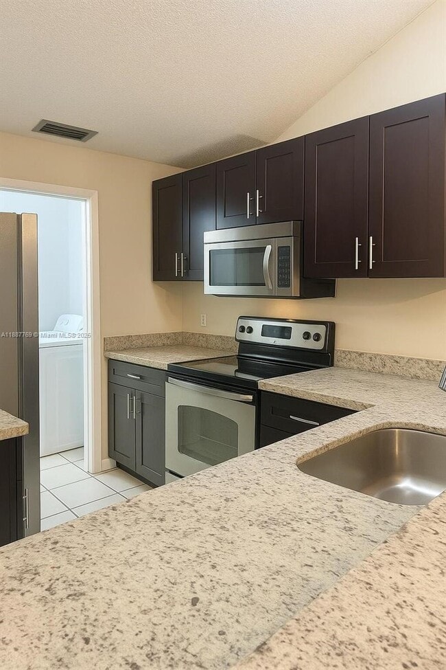 Building Photo - 6822 SW 39th St, 14G