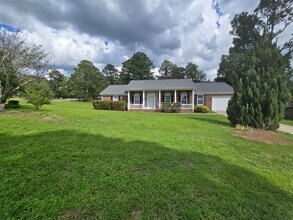 Building Photo - 7028 Lure Ct