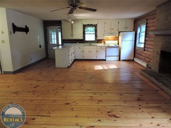 Photo - Cute Log Home Overlooking Wooded Area