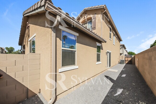 Building Photo - This home exudes a cheerful and welcoming charm!