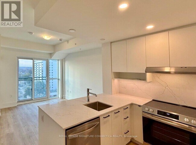 Photo du bâtiment - 206 King St W