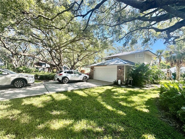 Foto del edificio - 6812 Arbor Oaks Dr