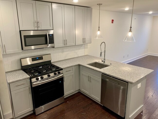Photo - Stunning 2-Bed Condo with Private Roof Deck in Norris Square! Available mid-July!