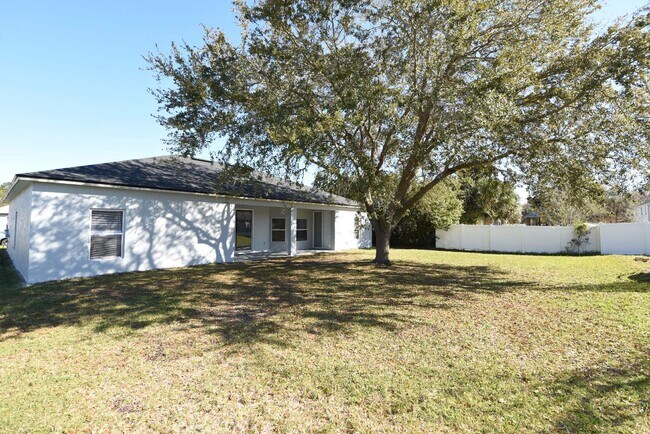 Foto del edificio - 4 bed, 2 bath located in Matanzas Woods su...