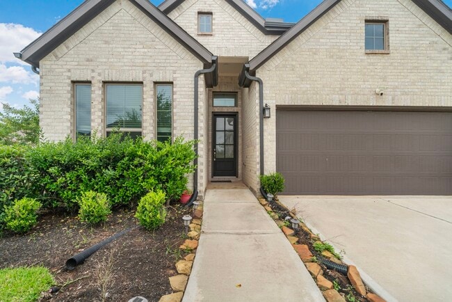 Foto del edificio - 10718 Blossom River Dr