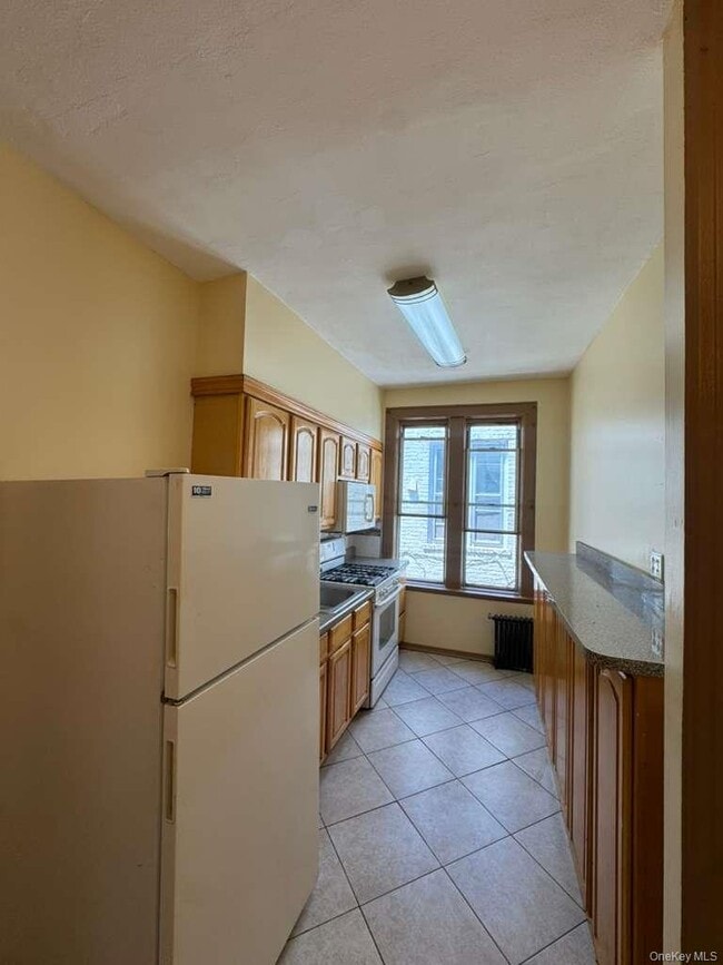 Building Photo - 26-28-28 96th St