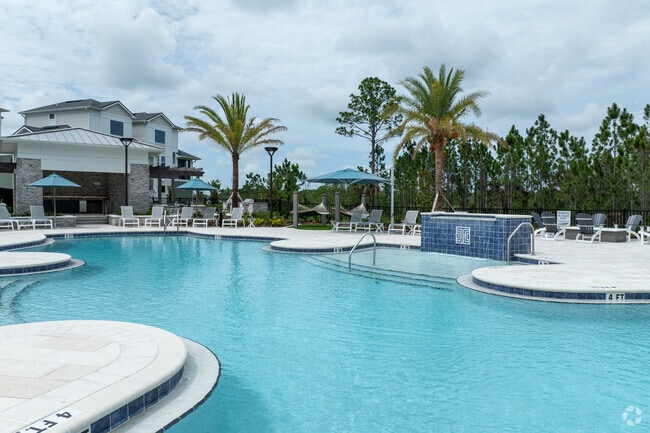 Piscina y Cascada - Integra Village at Tymber Creek