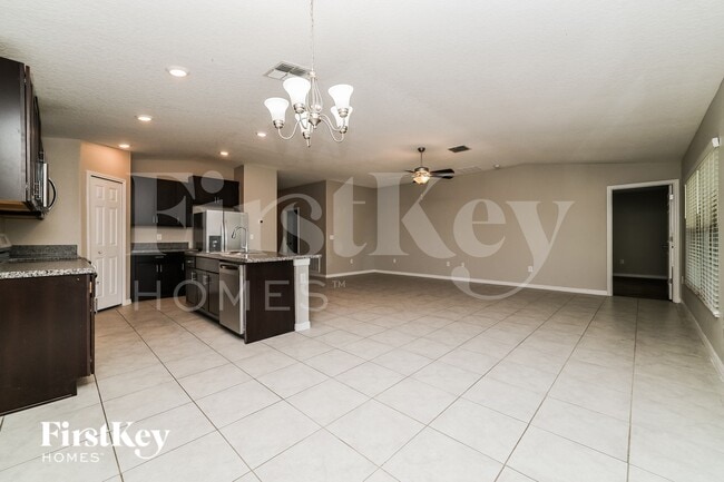 Building Photo - 10512 Strawberry Tetra Dr