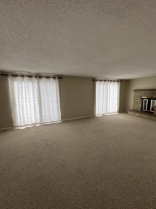 Living Room w/ Balcony Access - 1 Laura Ln