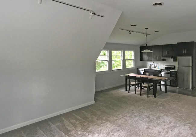 Living Area with Dining and Kitchen Beyond - 706 Duncan St