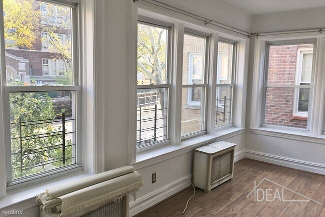 Building Photo - 7028 6th Ave