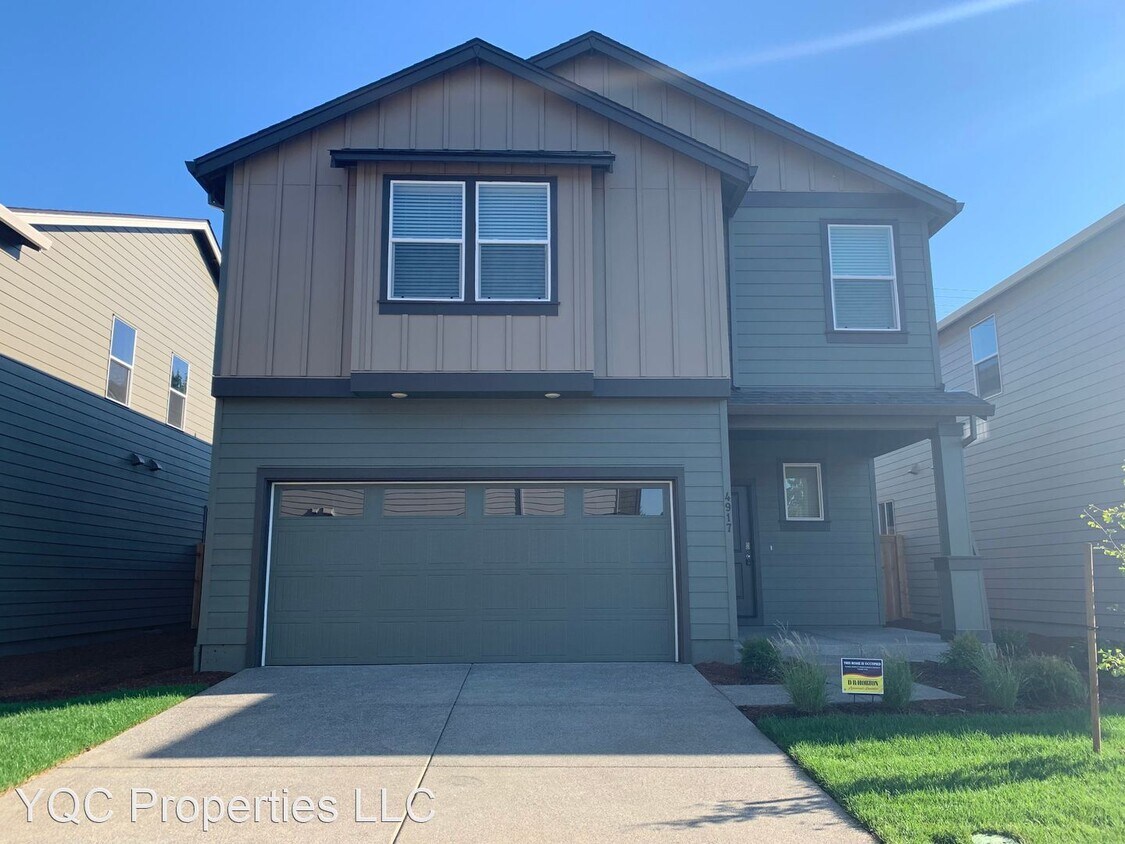 Foto principal - 4 br, 2.5 bath House - 4917 NE 24th Ave