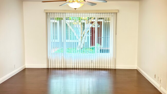 Oversized window with view of courtyard. Lots of natural light. - 10600 Eastborne Ave