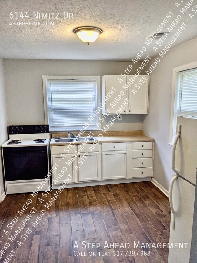 Building Photo - 6144 Nimitz Dr