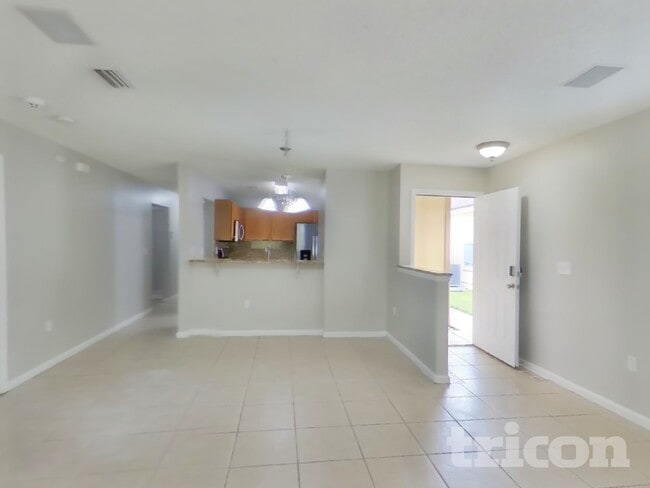 Building Photo - 7944 Cherry Blossom Dr S