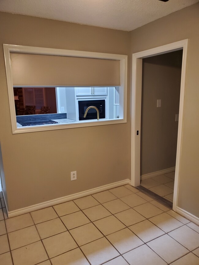 Kitchen open to dining area - 106 N Troy Ave