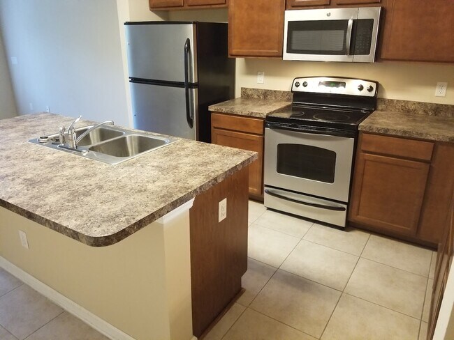 Foto del edificio - 4220 Plantation Oaks Blvd