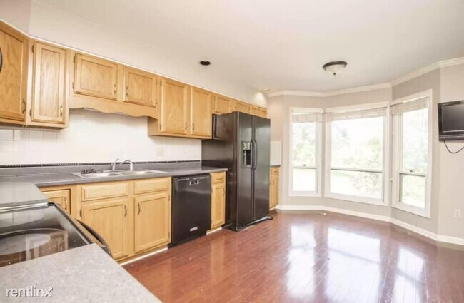 Building Photo - 3 br, 3.5 bath Condo - 8917 Wesley Pl