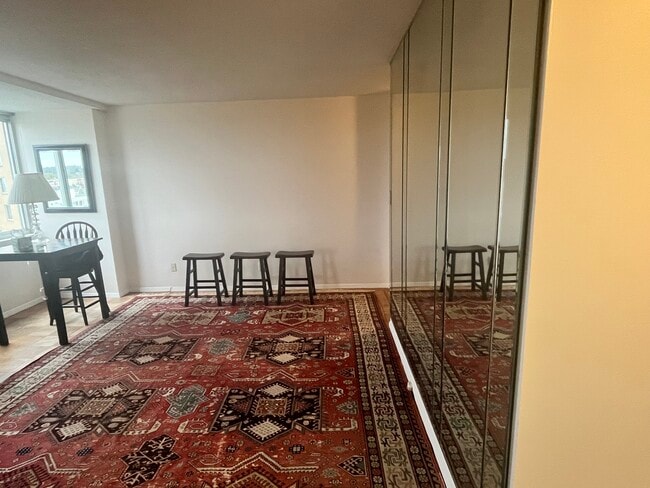 living room area with paneled wall ; large window DC vistas - 501 Slaters Ln