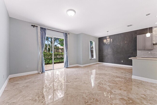 Building Photo - 6884 Julia Gardens Dr