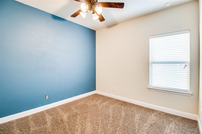 Building Photo - The home has 3 marvelous bedrooms and 2 fu...