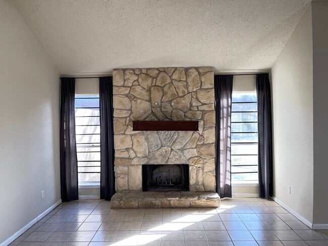 Beautiful stone fireplace - 12214 Wild Pine Dr