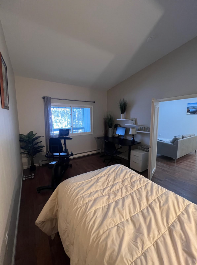 Bedroom 2 with stand up desk and stationary bike - 1881 E Tudor Rd