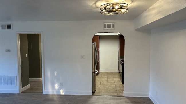 Large living space w new ceiling fans and light fixtures - 3825 E Camelback Rd