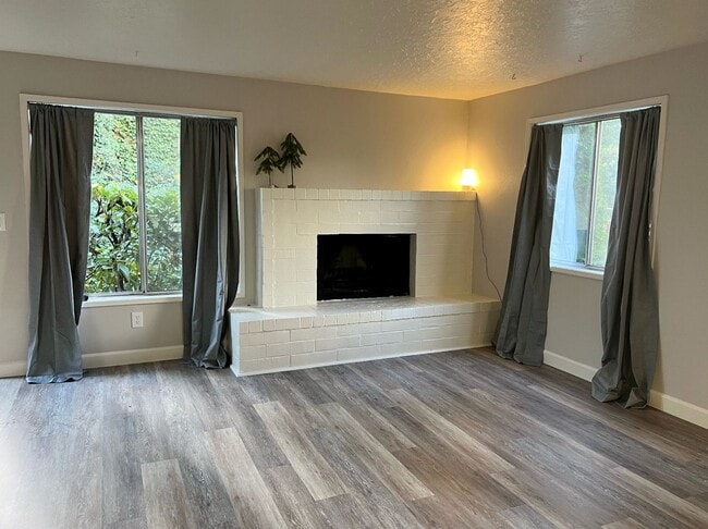 Building Photo - NEWLY REFRESHED Two Bedroom Townhome Style...